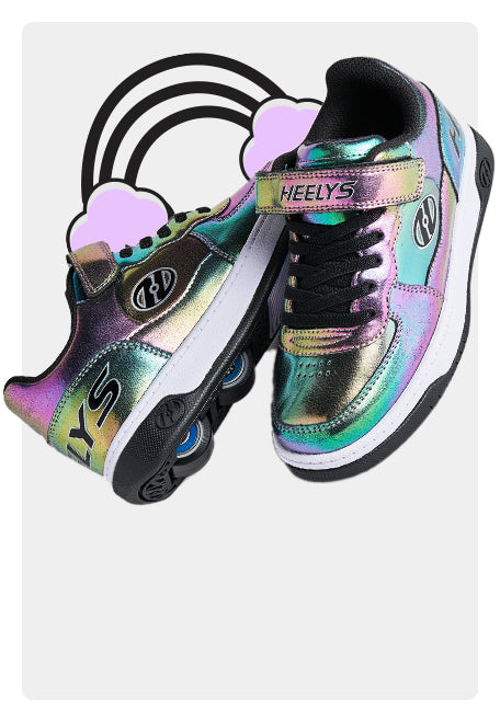 Colorful Girls Heelys roller shoes with rainbow design on a white background